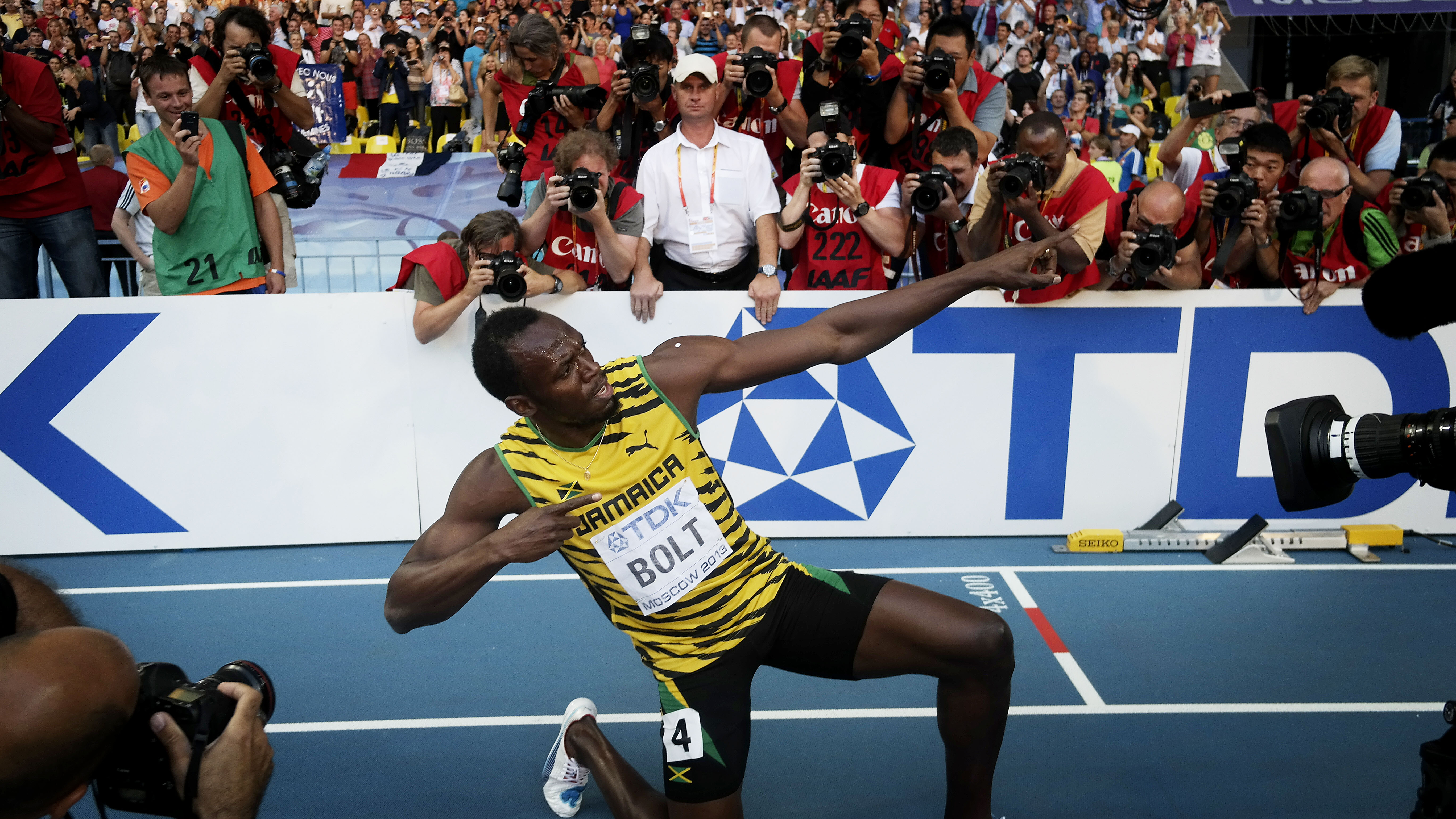 Usain adds the 200m title
